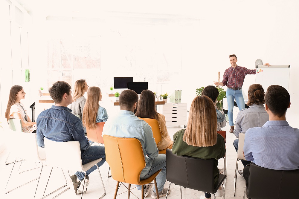 Employees in training lecture