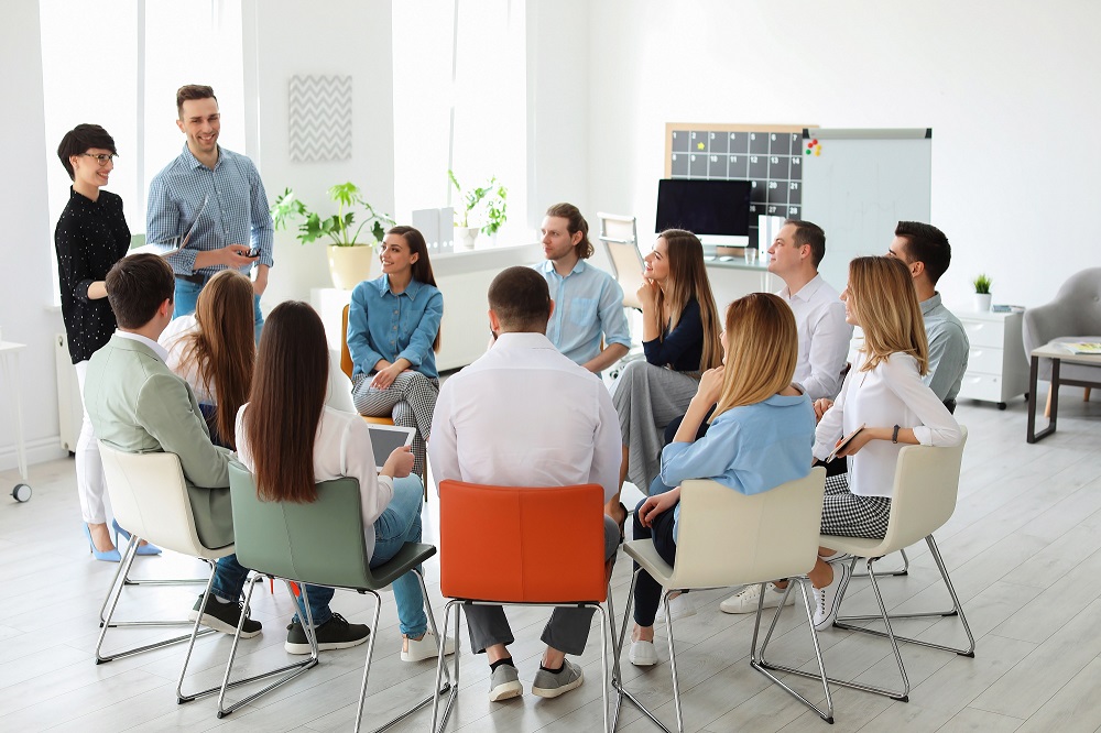 Employees Sitting in Circle